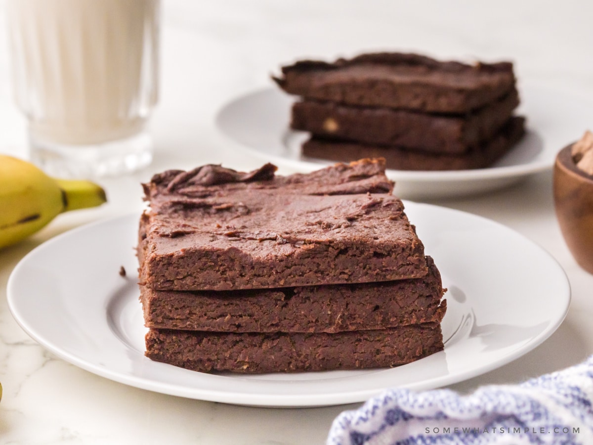 small stack of protein brownies on a white plate