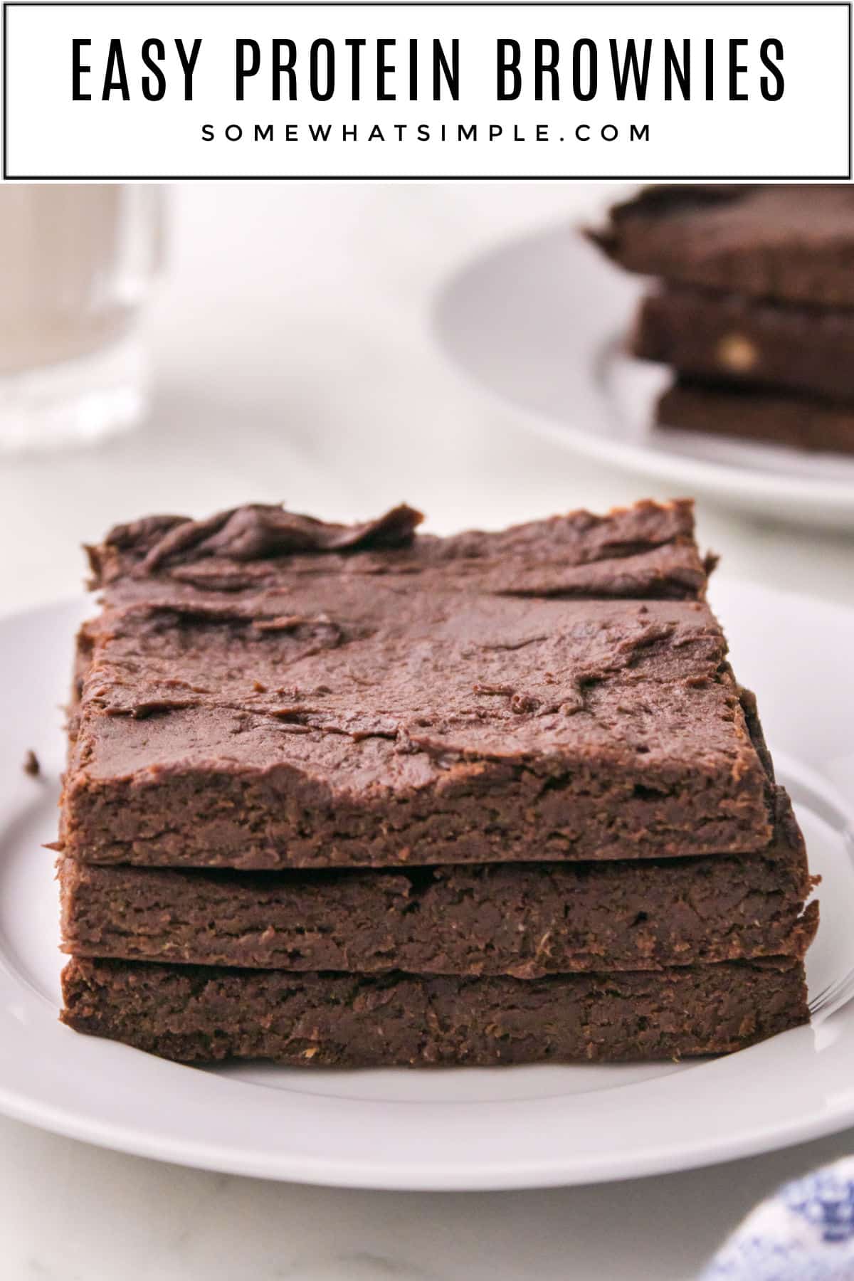 These Easy Protein Brownies are a treat that satisfies your sweet tooth and packs a protein punch to fuel your day! via @somewhatsimple