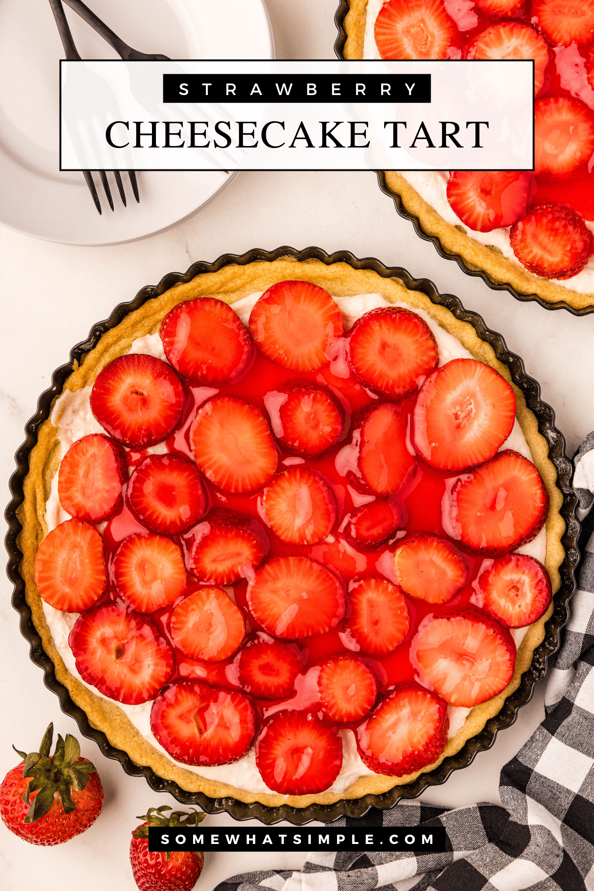 Fresh strawberries + a cheesecake filling + a sugar cookie crust = dessert heaven. This easy Cheesecake Strawberry Tart is the perfect mix of sweet, creamy, and fruity—and it looks just as good as it tastes. via @somewhatsimple