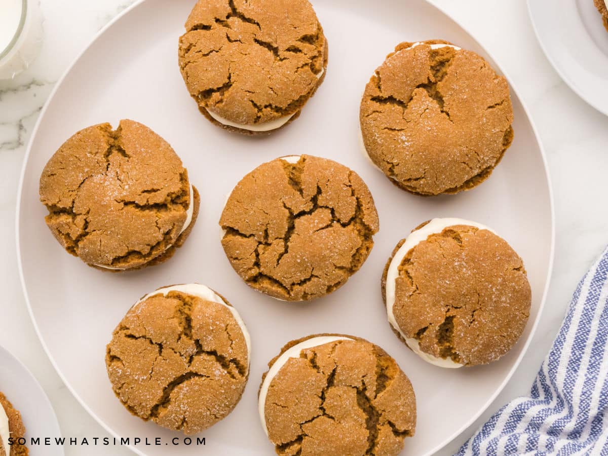 finished ginger sandwich cookies on a white plate