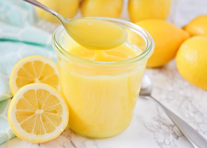 This homemade lemon curd is a delicious mixture of tart and sweet! It's perfect on waffles, pancakes, and ice cream, and adds a sweet burst of lemon flavor!