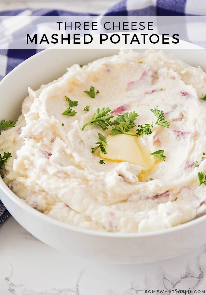 These cream cheese mashed potatoes are so delicious you'll never make them any other way again.  Loaded with a three cheese blend and a tasty blend of herbs and seasoning, these mashed potatoes are the perfect compliment to any dinner recipe. via @somewhatsimple