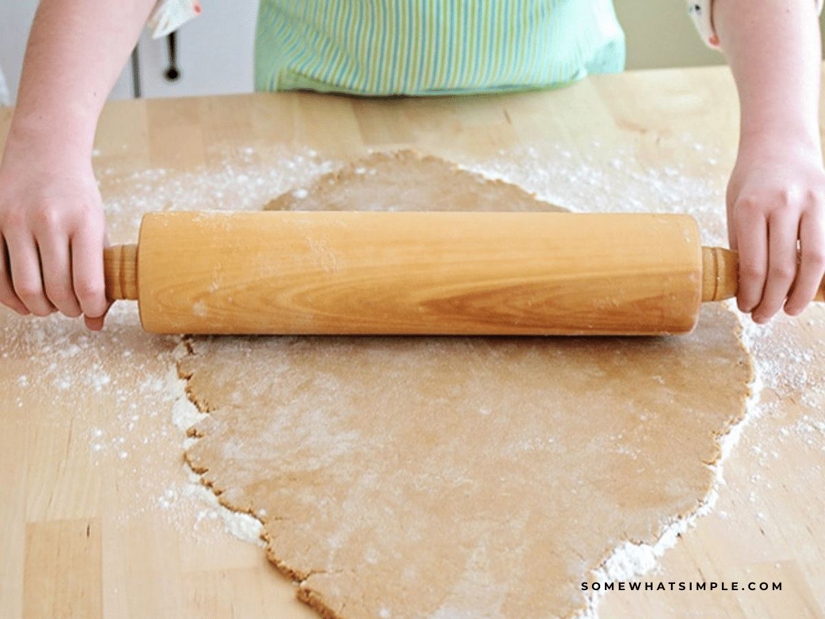 rolling out gingerbread cookie dough