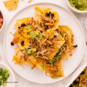 Game Day Loaded Nachos on a white plate