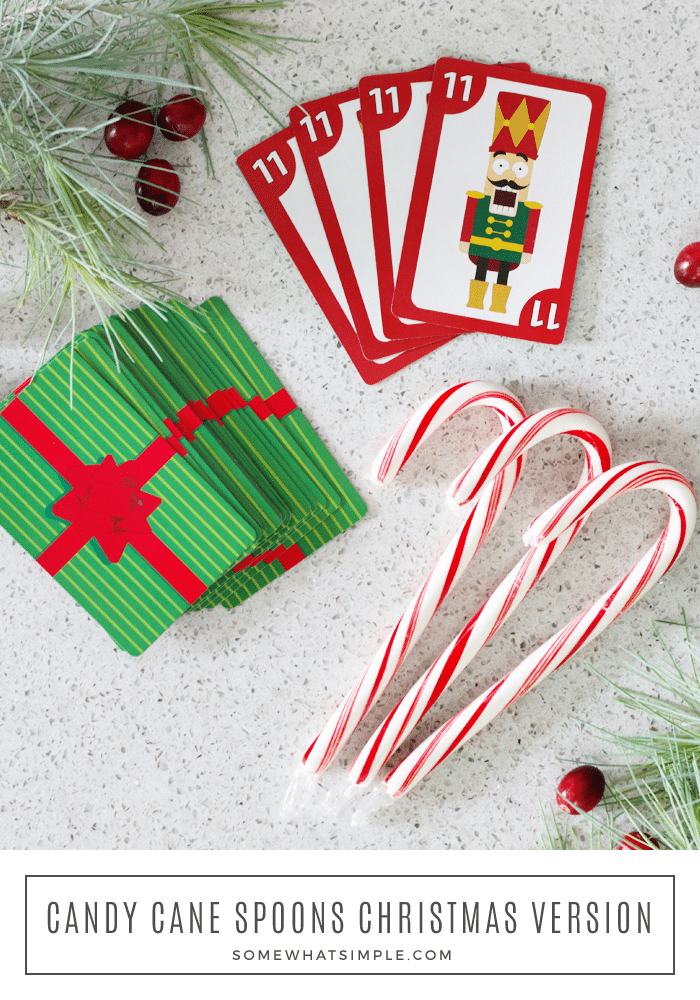 This Candy Cane Spoons Game is a festive twist on a classic card game. It's a great activity for large groups or small gatherings - and it's super easy to learn, which makes it fun for all ages! Grab your kids - it's time to teach them how to play spoons! #spoonsgame #howtoplayspoons #spoonsrules #spoonscardgame #candycanespoons via @somewhatsimple