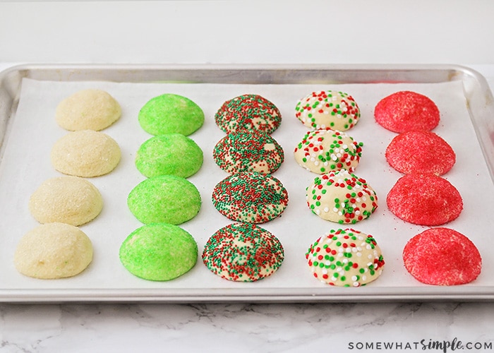 freshly baked Christmas blossom cookies on a baking sheet