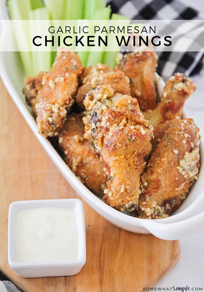 These savory baked garlic parmesan chicken wings are flavorful and delicious, and so easy to make. They're perfect for parties or tailgaiting! #chickenwings #parmesangarlicchickenwings #appetizer #partyfood #easyrecipe #garlicwings via @somewhatsimple