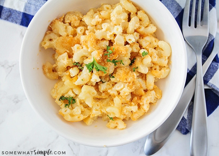 looking down on a bowl of baked macaroni and cheese with bread crumbs on top