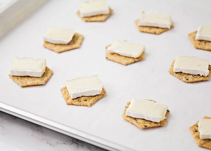 These cranberry brie appetizer bites are super flavorful, and so quick to make. They're a festive and delicious holiday appetizer!