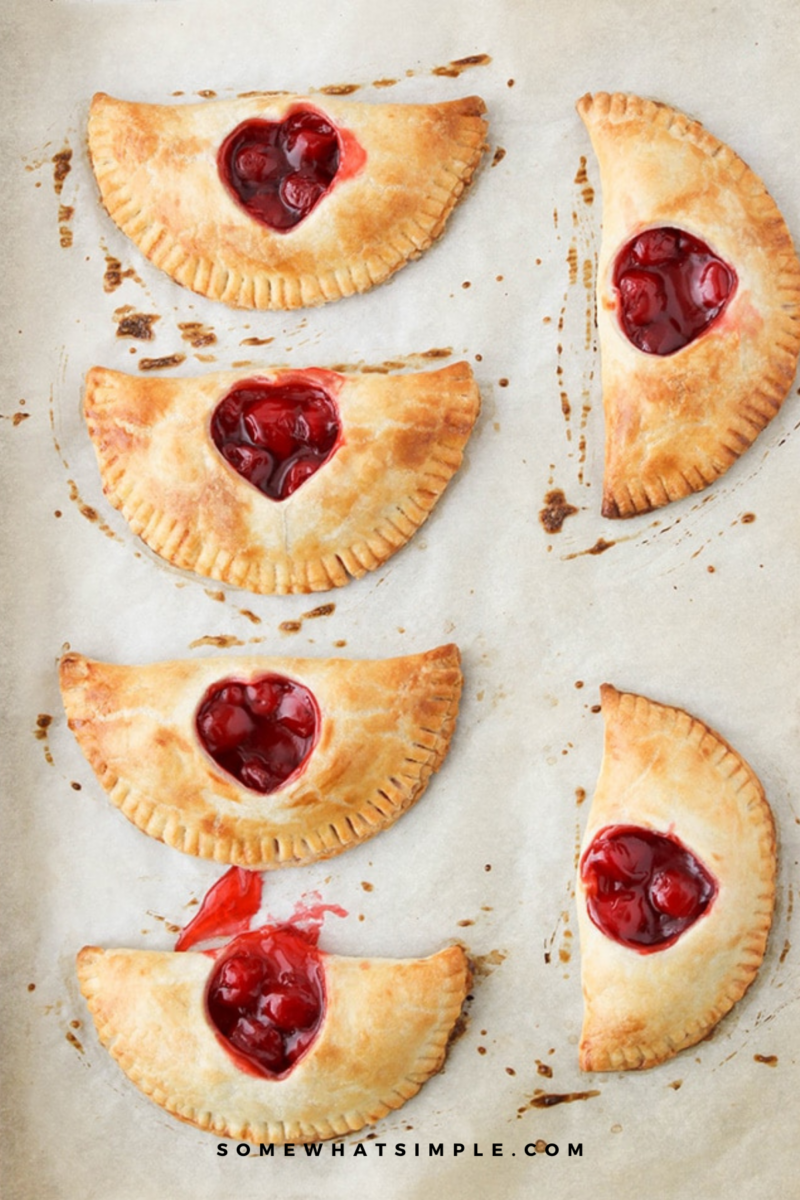 baked Cherry Hand Pies on a baking sheet