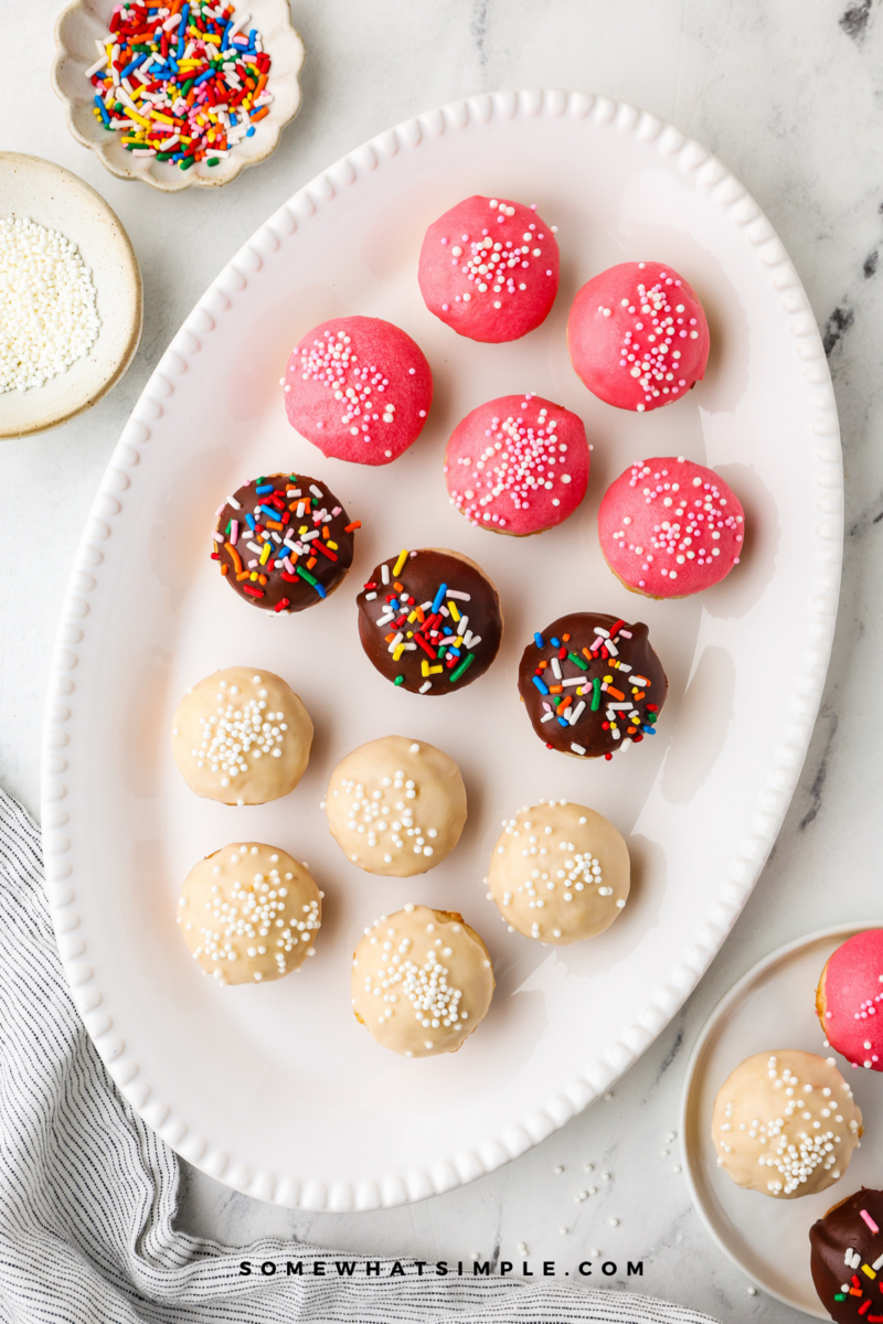 variety of Donut Muffins on a white serving platter