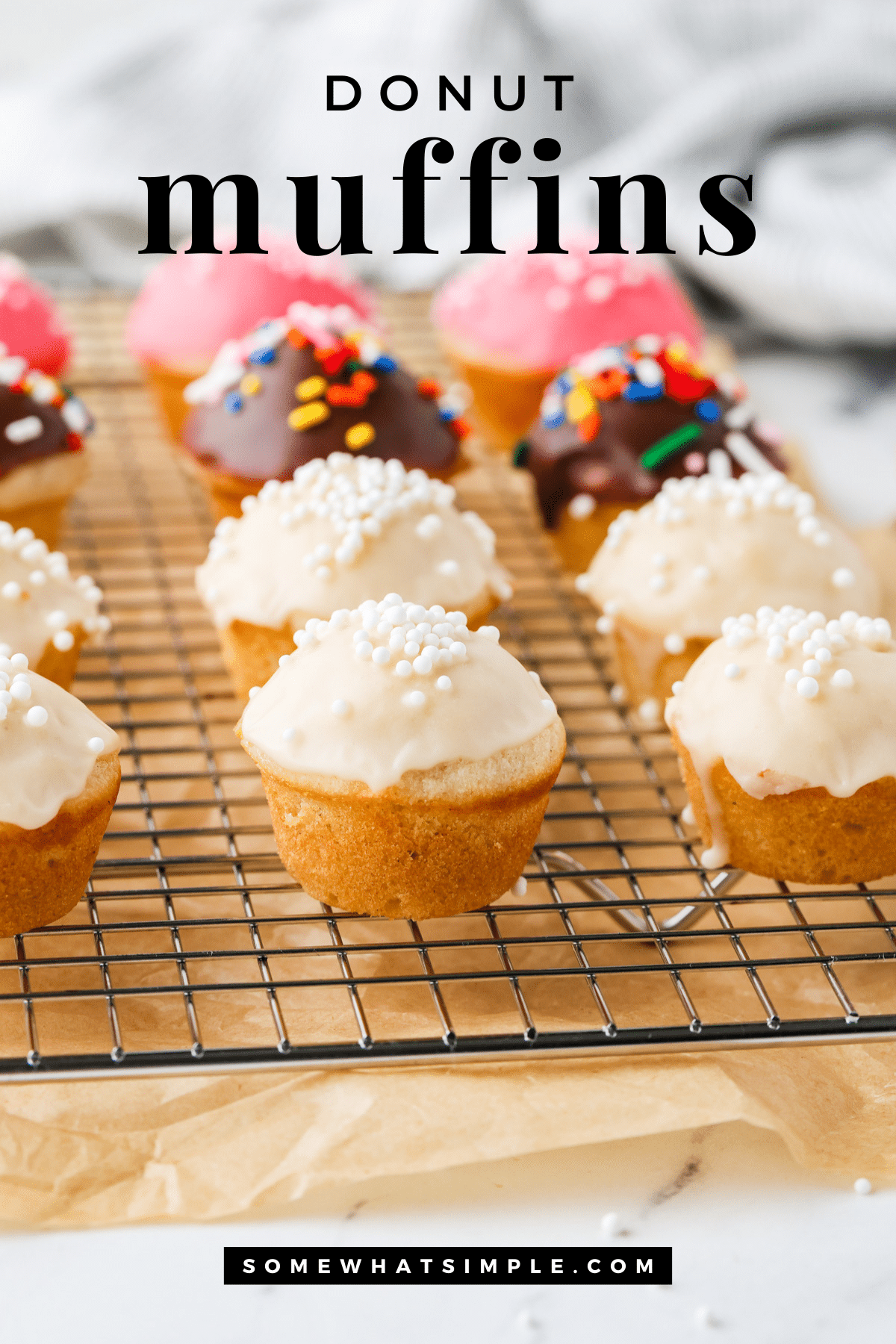 These easy donut muffins taste just like donut holes! Soft, flavorful, and topped with simple glazes—perfect for breakfast or brunch. via @somewhatsimple