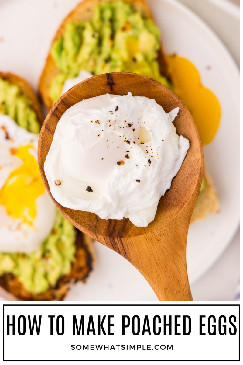 close up shot of a wooden spoon holding a poached egg over avocado toast