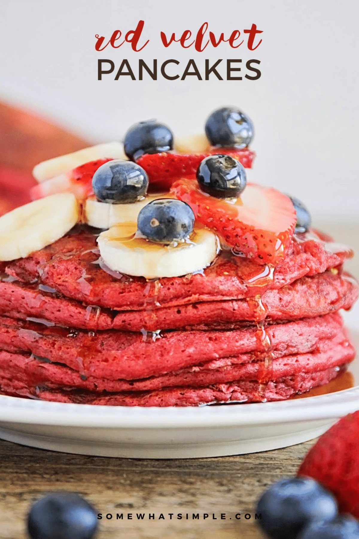 Make these fluffy red velvet pancakes for birthdays, Valentine’s Day, or a show-stopping breakfast. So easy and delicious! via @somewhatsimple