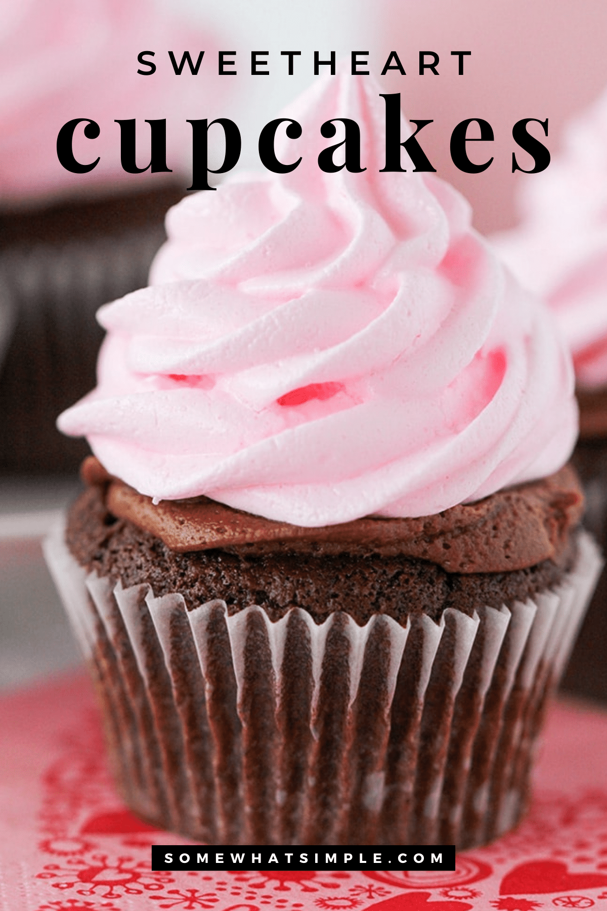Make adorable sweetheart cupcakes topped with pink meringue cookies. Easy, make-ahead dessert perfect for parties, Valentine’s Day, and celebrations. via @somewhatsimple