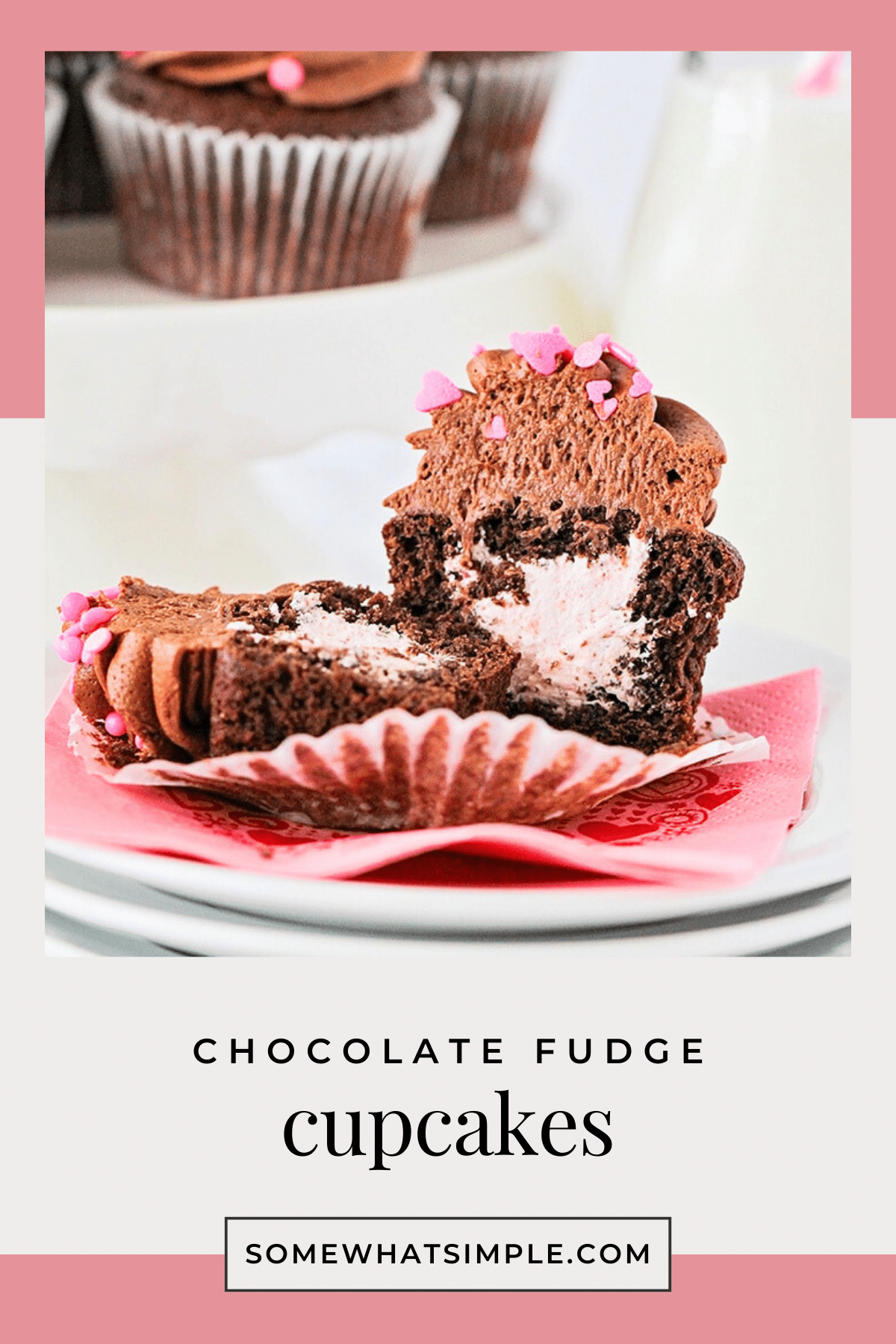 Make the best chocolate fudge cupcakes with a creamy strawberry filling. This simple recipe is easy, delicious, and always a crowd favorite. via @somewhatsimple