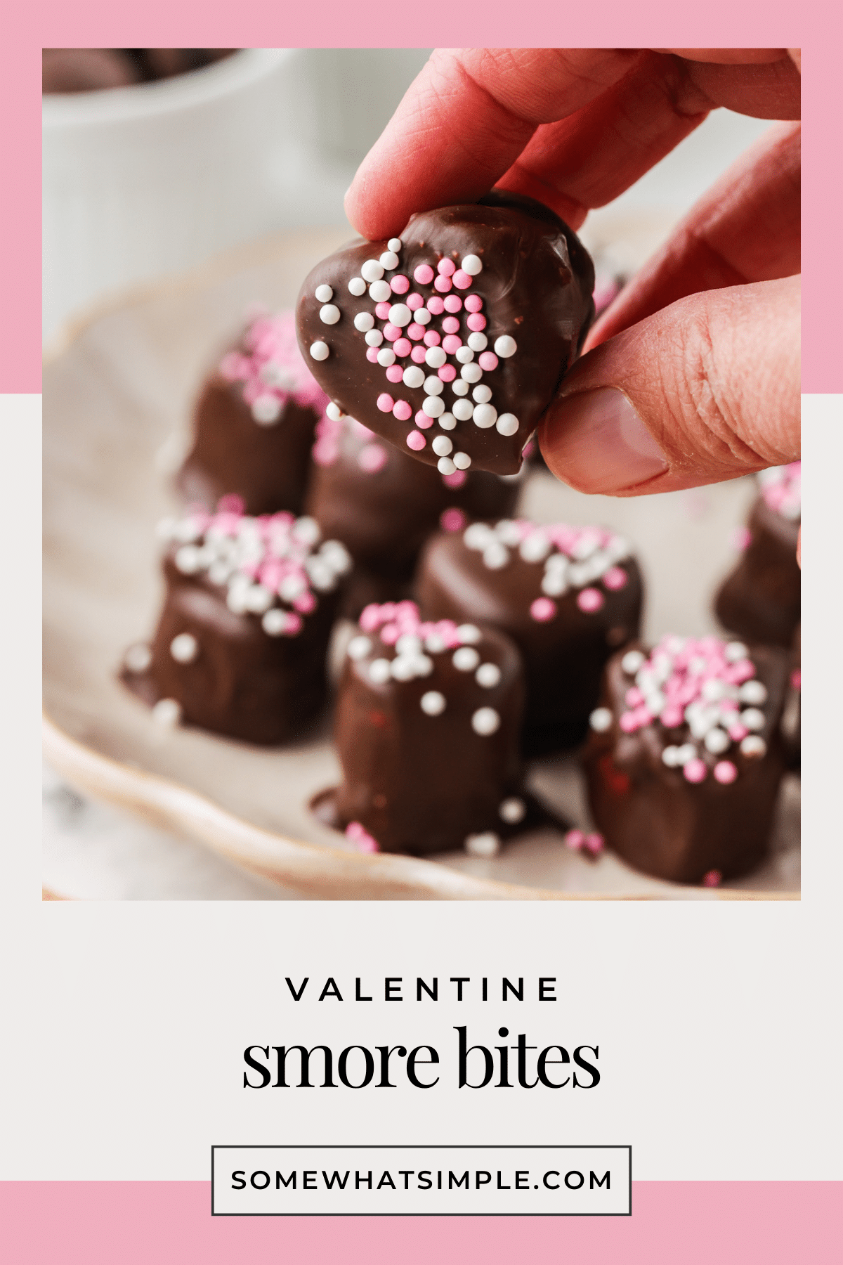 These Valentine S’more Bites are an easy no-bake treat made with just 4 ingredients. Cute, chocolatey, and perfect for Valentine’s Day. via @somewhatsimple