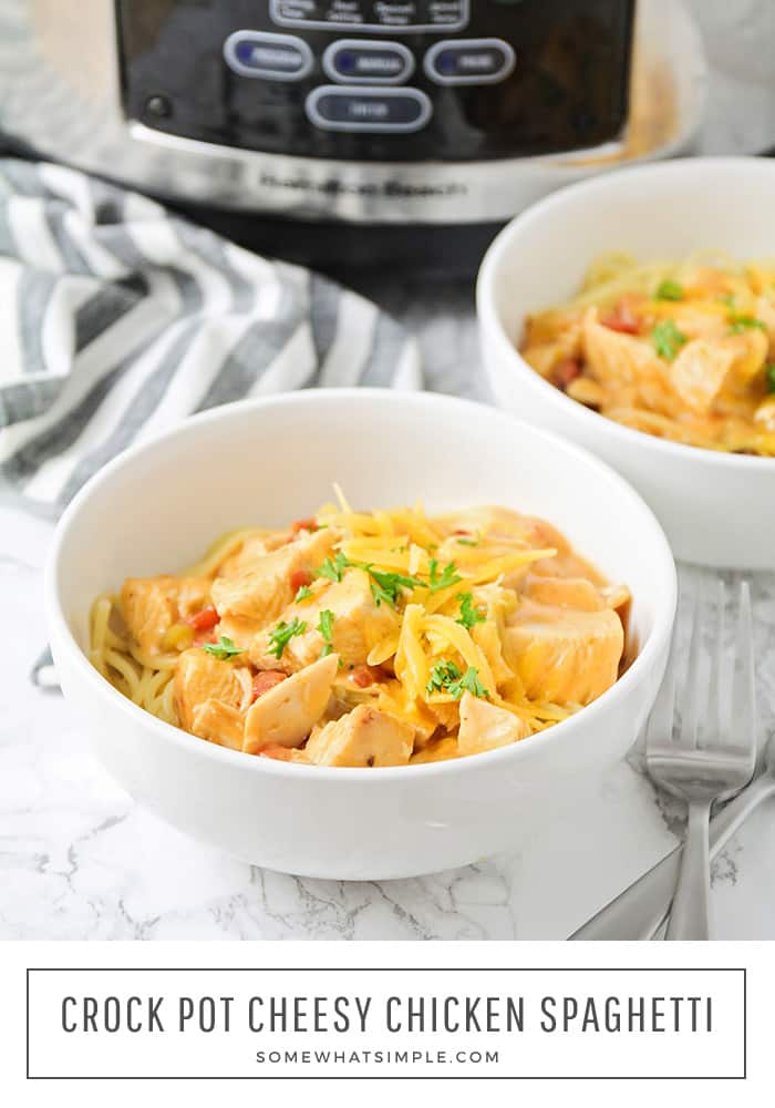 This crock pot cheesy chicken spaghetti recipe is super delicious and SO simple to make!  Loaded with tender chicken and melted cheese, this recipe is perfect to make on a busy day. #crockpotspaghettirecipe #crockpotcheesychickenspaghetti #slowcookerspaghetti #howtomakespaghettiinacrockpot via @somewhatsimple