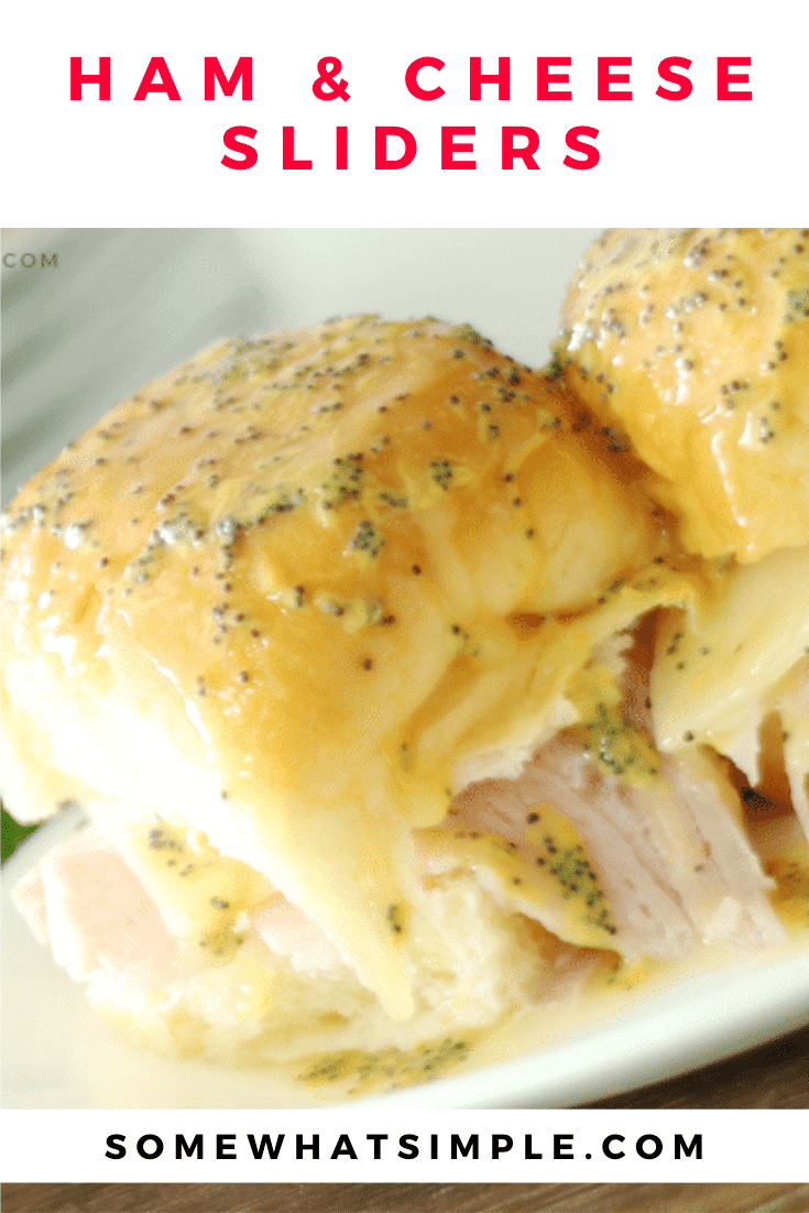 Juicy ham and Swiss cheese inside soft Hawaiian rolls brushed with a buttery topping that's baked is absolutely delicious! These Ham and Cheese Sliders are perfect as a simple dinner or feeding a crowd and could not be any easier to make! #hamsliders #hamandswisssliders #howtomakehamandcheesesliders #hamandcheesesliderrecipe #hawaiianrollhamsliders via @somewhatsimple