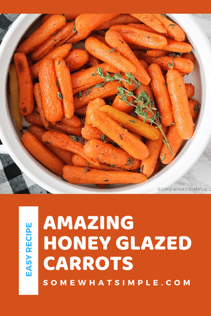 Honey glazed carrots make a simple side dish that is delicious, healthy, and so easy to make!  Drizzle these roasted carrots in a honey and olive oil glaze that will make them irresistibly sweet! These are the perfect side dish for your holiday dinner or just something different any day of the week. via @somewhatsimple