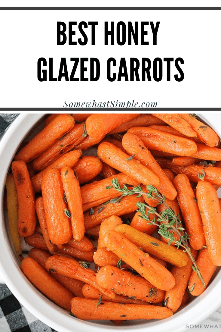 Honey glazed carrots make a simple side dish that is delicious, healthy, and so easy to make!  Drizzle these roasted carrots in a honey and olive oil glaze that will make them irresistibly sweet! These are the perfect side dish for your holiday dinner or just something different any day of the week. via @somewhatsimple