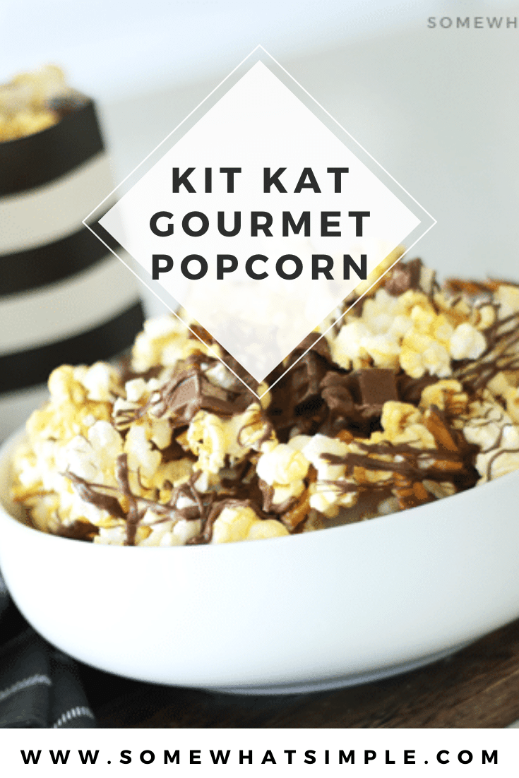 This gourmet Kit Kat popcorn recipe is full of pretzels, candy bars, melted chocolate and buttery popcorn! It is the perfect combination of salty and sweet and is definitely the ultimate snack in a bowl. #gourmetpopcornrecipe #homemadegourmetpopcorn #kitkat #gourmetpopcorn #movienight #gourmetpopcornrecipe via @somewhatsimple