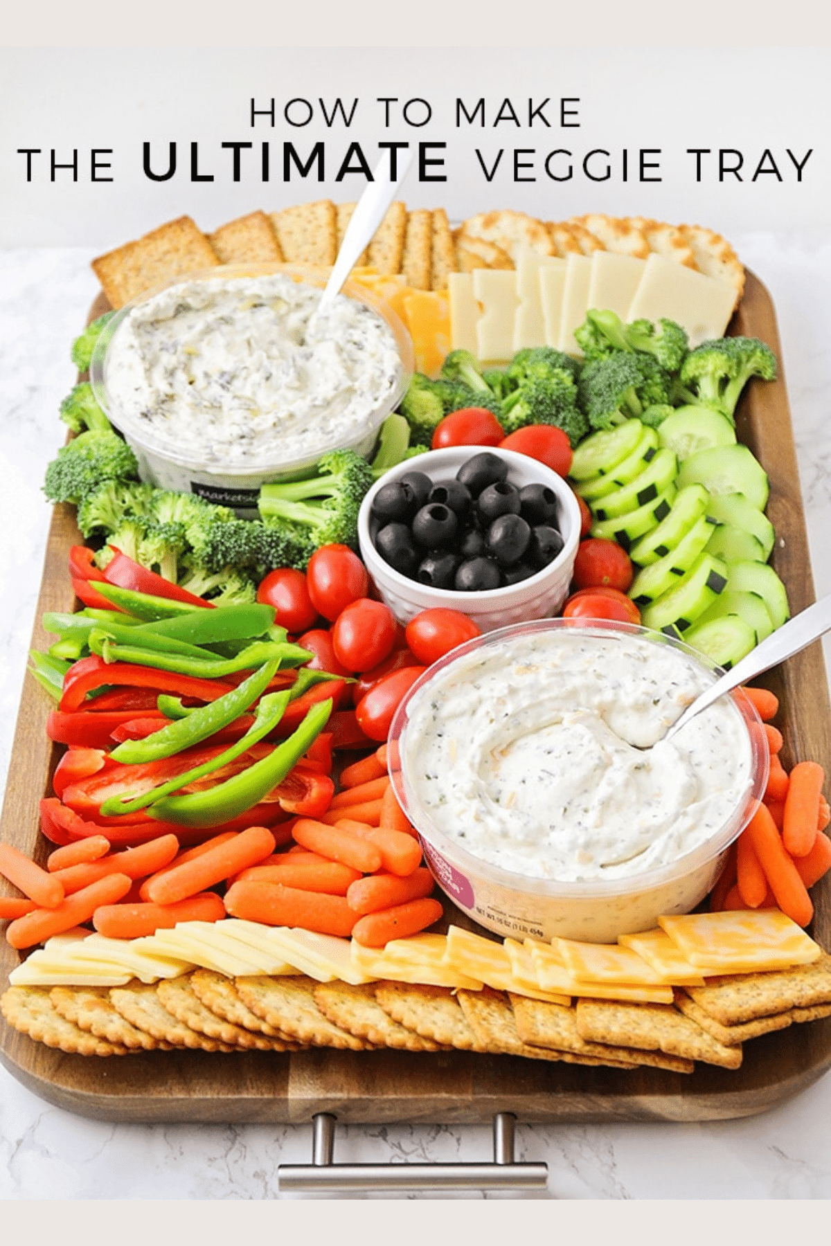 Impress your guests with this beautiful, festive and healthy veggie tray! This savory appetizer is a perfect compliment to any party. It's quick and easy to put together, and there's something for everyone to enjoy! via @somewhatsimple