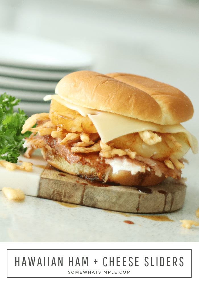 Hawaiian ham sandwiches are made with slices of baked ham and pineapple then topped with fried onions and teriyaki sauce all on a sweet King's Hawaiian roll.  Once you've had one, you'll never eat a ham sandwich any other way.  #hawaiianhamsandwich #hawaiianhamandcheesesandwich #hawaiianrollhamandcheesesliders #hawaiianrollhamsandwich #hamandcheesehawaiianrolls via @somewhatsimple