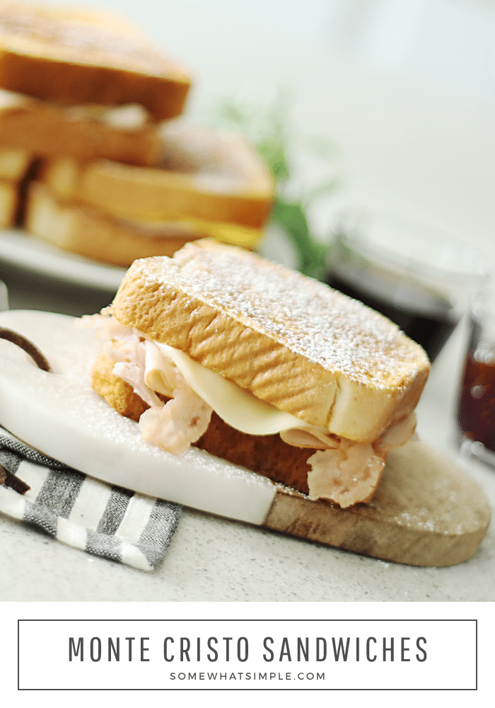 This Monte Cristo Sandwich is a quick and easy meal that will leave your tastebuds wanting more! Soft bread filled with delicious meats and cheeses, dipped in an egg/milk mixture, then cooked to a golden brown. This "French Toast" sandwich is one of my family's very favorite dinners! #montecristo #montecristosandwich #montecristodisneyland #copycatmontecristosandwich #howtomakeamontecristosandwich via @somewhatsimple