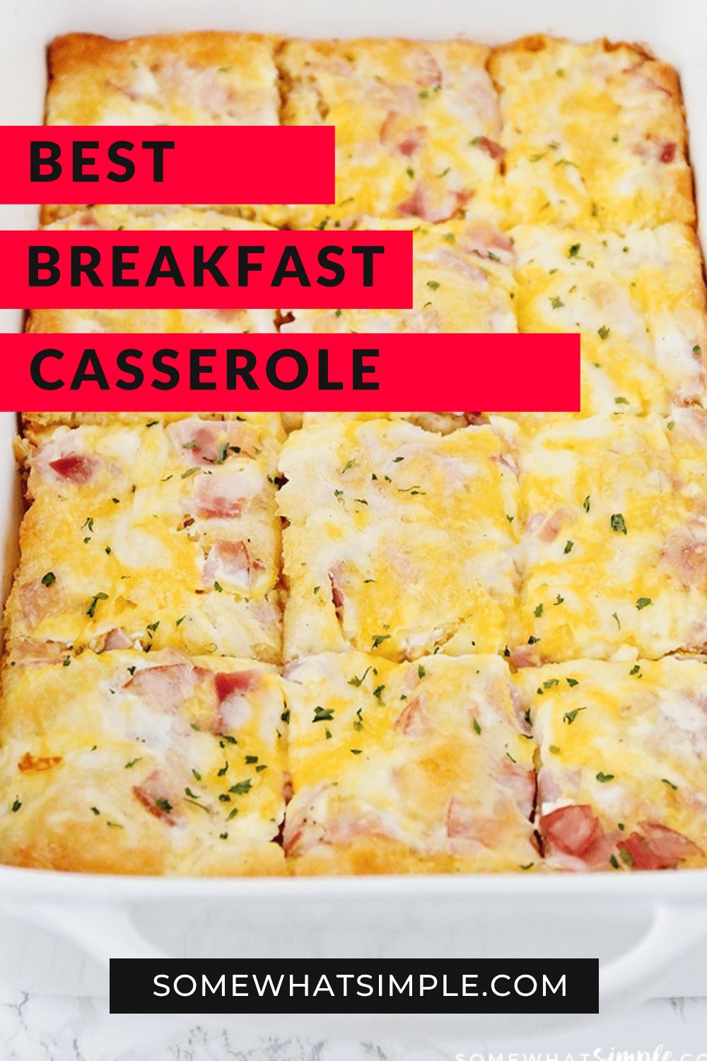 This easy croissant breakfast egg casserole recipe is an easy recipe that is perfect for either breakfast or dinner! Made with eggs, ham (or sausage) and melted cheese baked over a croissant crust that is a perfect way to start the morning! Plus, it only takes minutes to prepare, so you'll have a delicious breakfast in no time! via @somewhatsimple