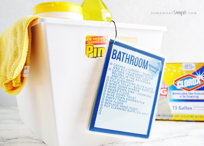 cleaning checklist attached to a white bucket