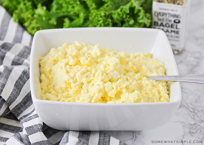 a square bowl of the best egg salad recipe