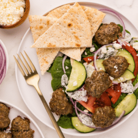 gyro salad plated on a white plate