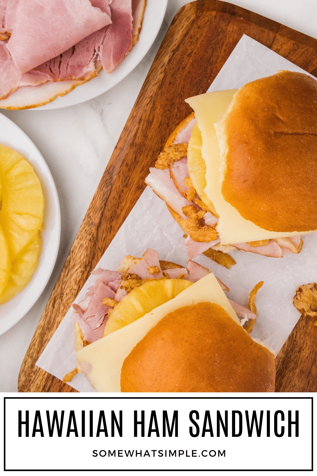 Hawaiian ham sandwiches are made with slices of baked ham and pineapple then topped with fried onions and teriyaki sauce all on a sweet King's Hawaiian roll.  Once you've had one, you'll never eat a ham sandwich any other way. #hawaiianhamsandwich #hawaiianhamandcheesesandwich #hawaiianrollhamandcheesesliders #hawaiianrollhamsandwich #hamandcheesehawaiianrolls via @somewhatsimple