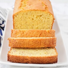 a loaf of banana bread made using cake mix with three slices cut off the end of the loaf