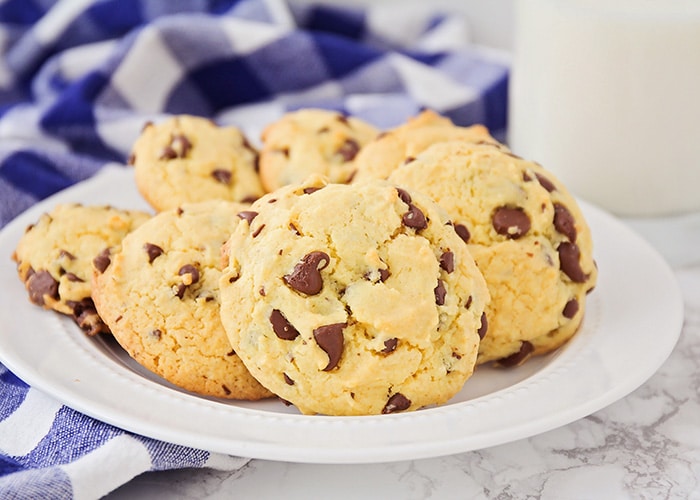 a plate full of chocolate chip cookies that were made using a box of cake mix