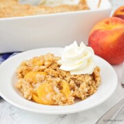 This simple and delicious peach cobbler is made with cake mix, and has only 5 minutes of hands on time. It's the perfect summer dessert!