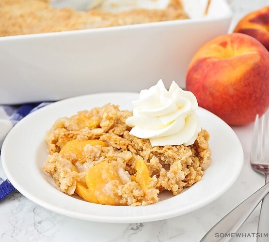 This simple and delicious peach cobbler is made with cake mix, and has only 5 minutes of hands on time. It's the perfect summer dessert!