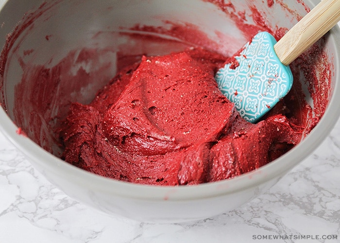 a bowl of red velvet cake mix batter