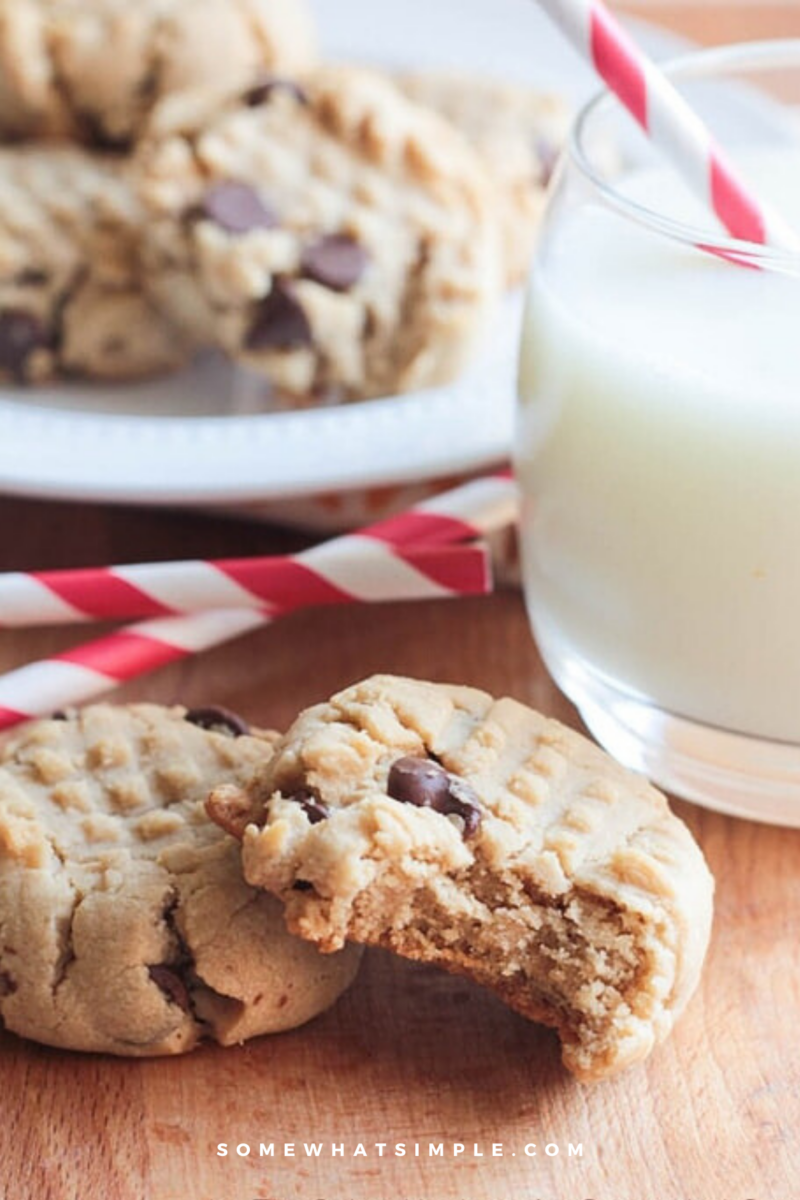 2 PB Choc Chip Cookies with a plate full in the background