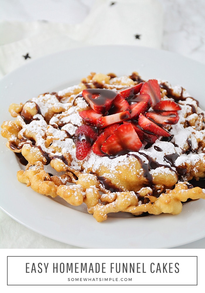 These simple homemade funnel cakes are so easy to make! Dust them with powdered sugar, or pile them high with delicious toppings! Now you can enjoy your favorite theme park treat from the comfort of your own home! #funnelcakes #funnelcakerecipe #easyfunnelcakerecipe #howtomakefunnelcakes #homemadefunnelcakesrecipe via @somewhatsimple