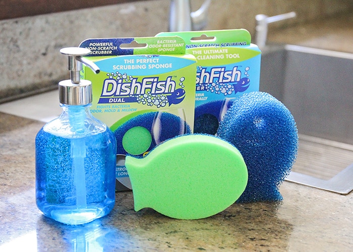 sponges and soap on a counter