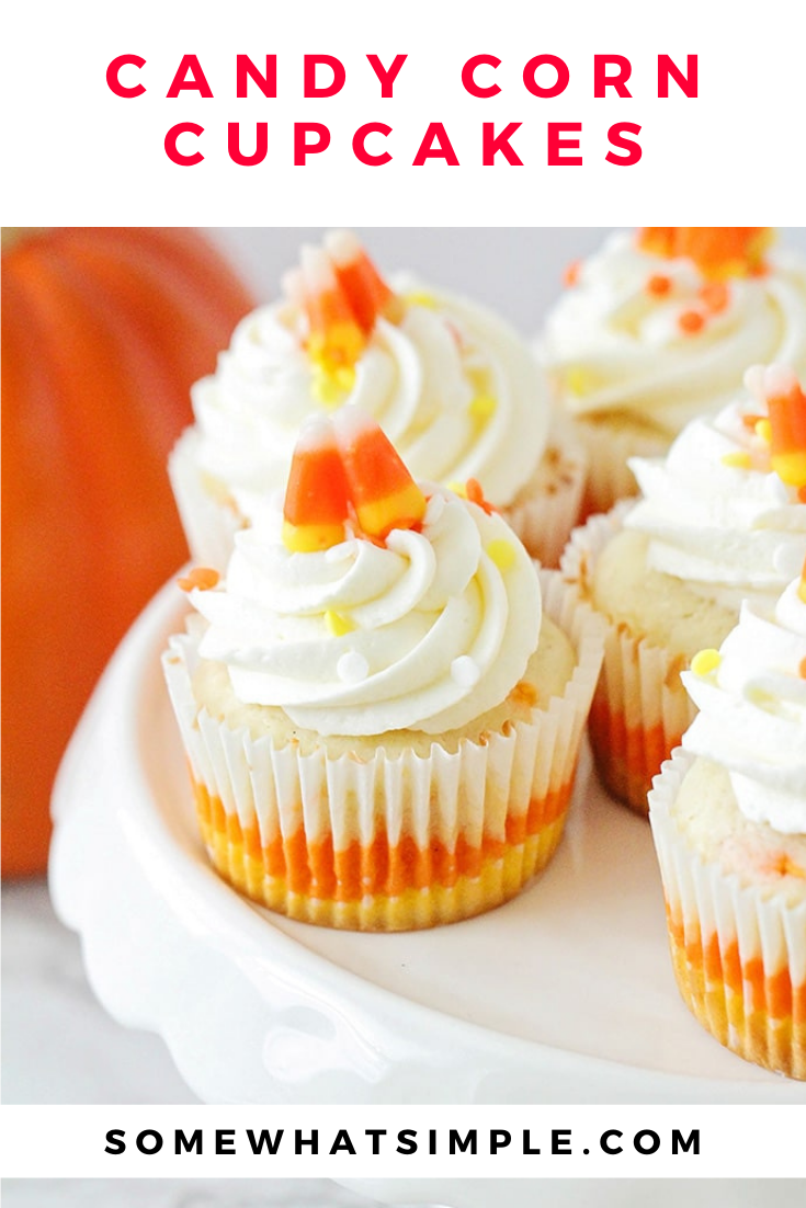 Candy corn cupcakes are a delicious treat that are adorably festive and super easy to make!  Those yellow, orange and white colors just scream Fall! The cupcakes are perfect to serve at a Halloween party or any fall event. via @somewhatsimple