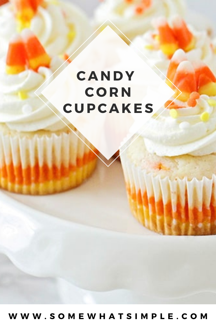 Candy corn cupcakes are a delicious treat that are adorably festive and super easy to make!  Those yellow, orange and white colors just scream Fall! The cupcakes are perfect to serve at a Halloween party or any fall event. via @somewhatsimple