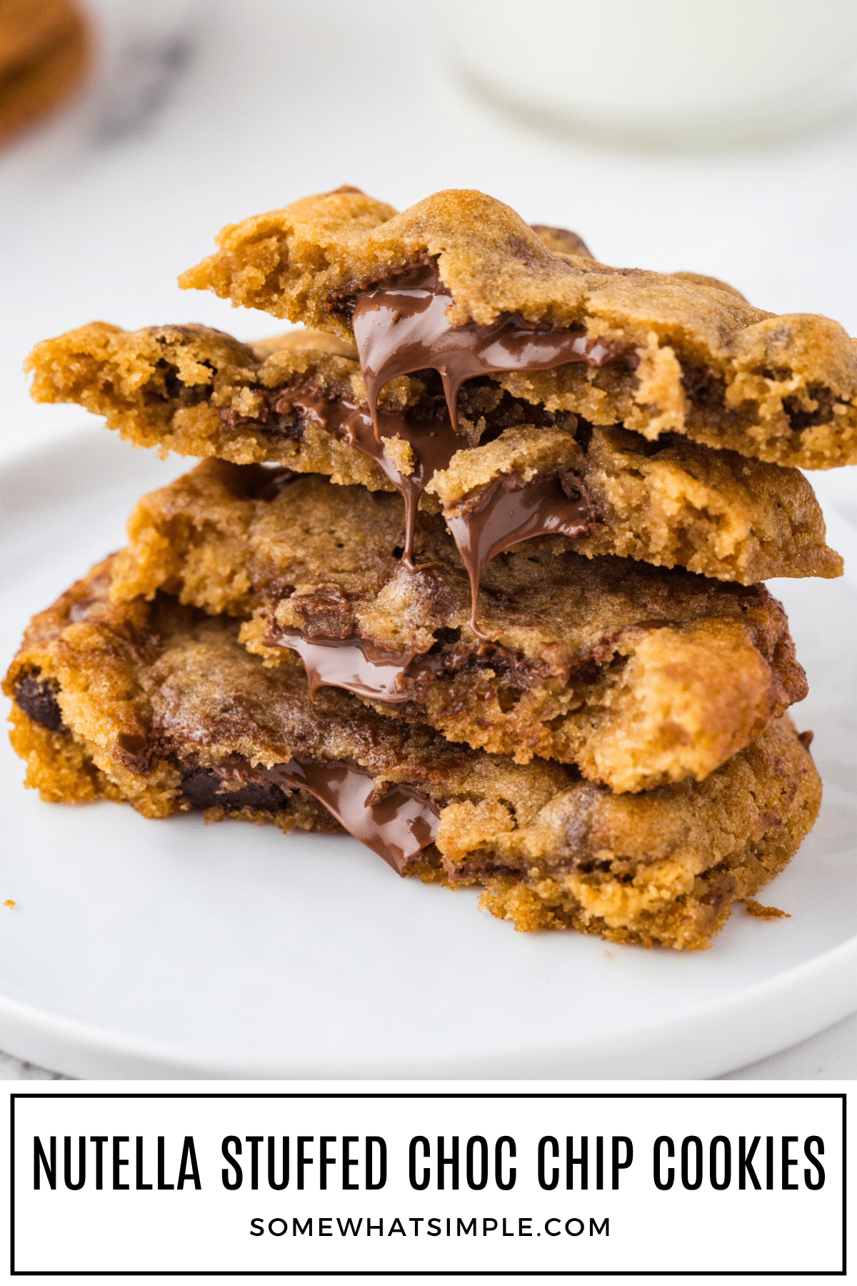 Nutella Stuffed Chocolate Chip Cookies takes the classic treat we love and gives it a gooey, chocolate twist you won’t be able to resist. via @somewhatsimple