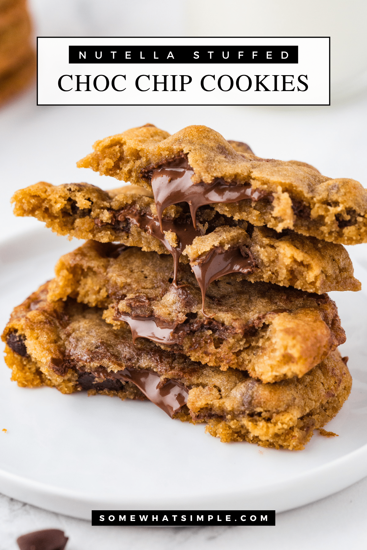 Nutella Stuffed Chocolate Chip Cookies takes the classic treat we love and gives it a gooey, chocolate twist you won’t be able to resist. via @somewhatsimple