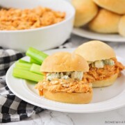 buffalo chicken sliders with ranch dressing and celery sticks