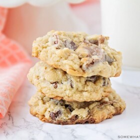 a stack of turtle oatmeal cookies on a counter