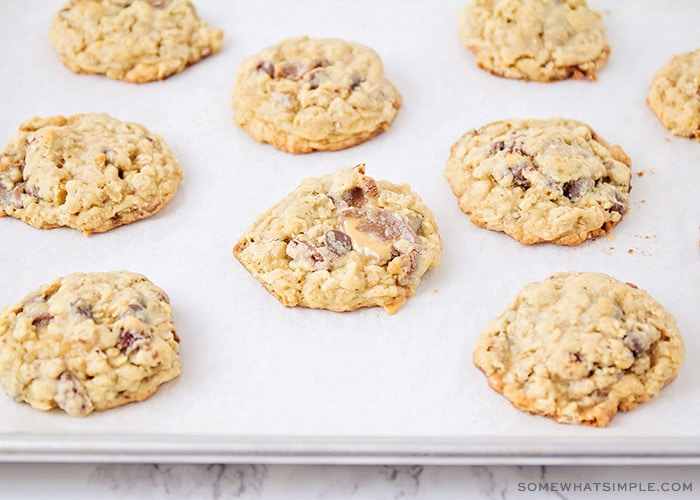 turtle chocolate chip cookies on a baking sheet