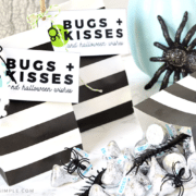 a close up of the bugs and kisses printable with hershey's kisses and plastic bugs next to them